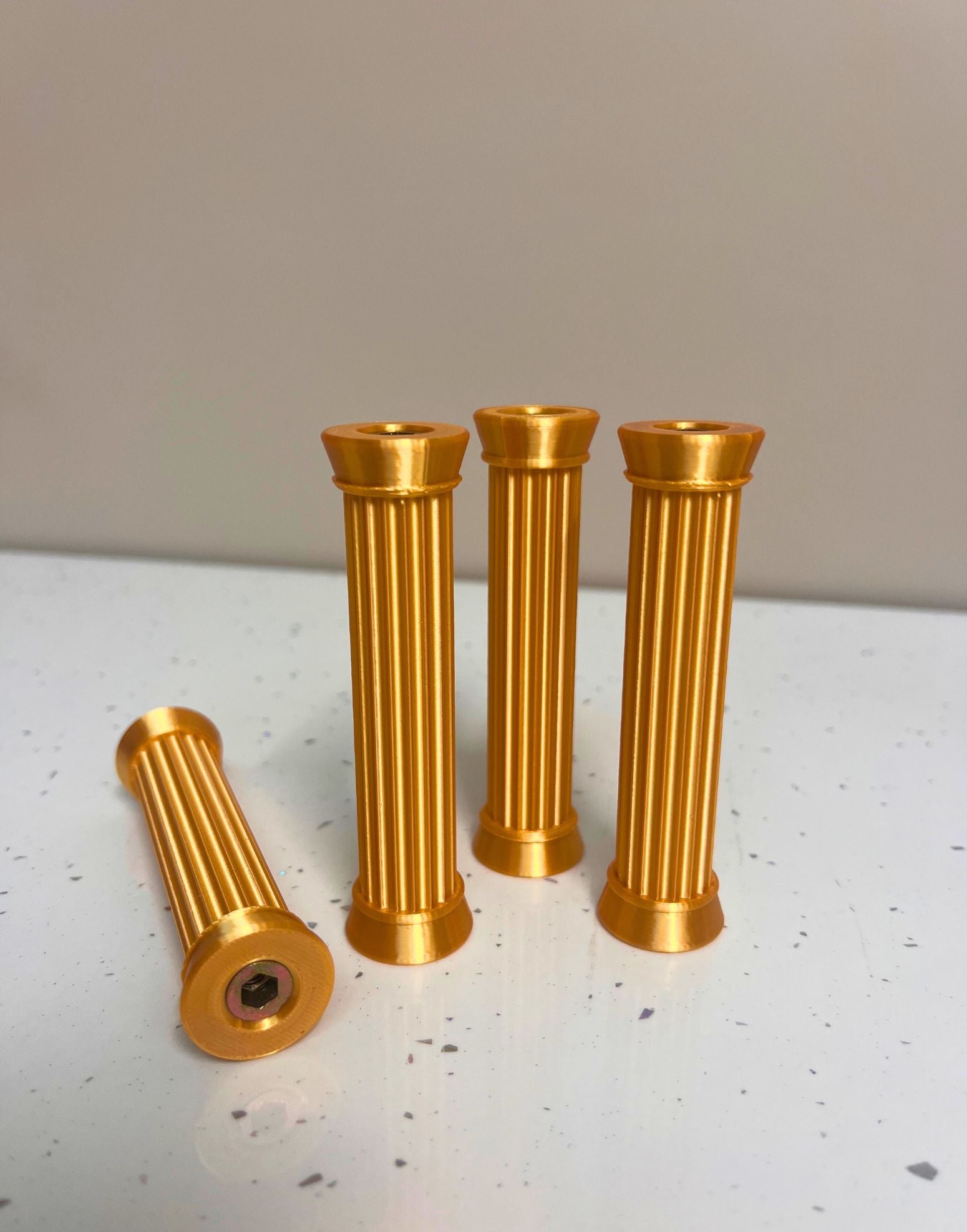 Gold Coloured Columns for the Column Separator 